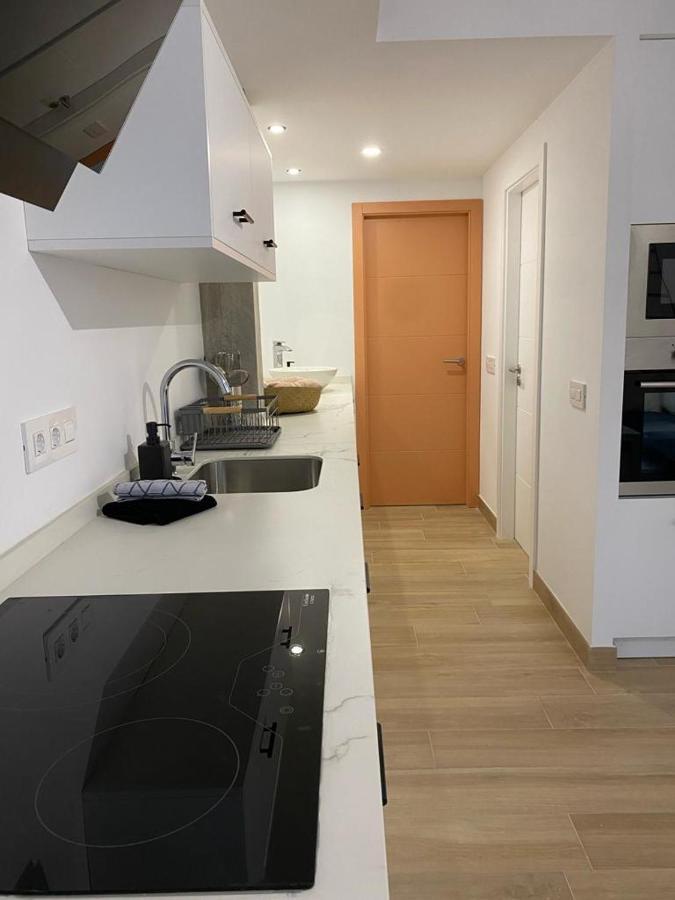 Detail Rose Apartment ปูแอร์โตเดลาครูซ ภายนอก รูปภาพ
