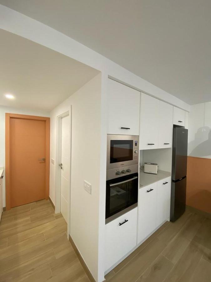 Detail Rose Apartment ปูแอร์โตเดลาครูซ ภายนอก รูปภาพ